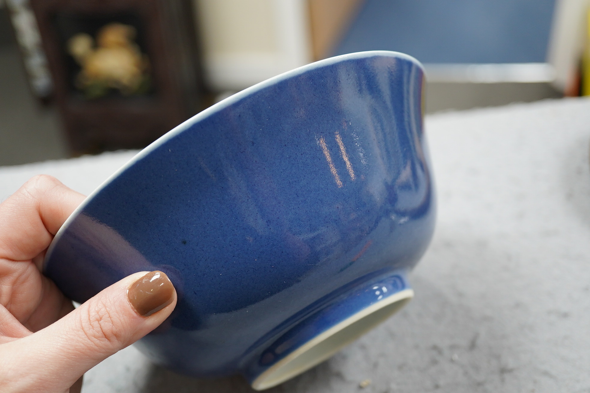 A pair of Chinese powder blue glazed bowls, Daoguang mark and of the period (1821-50)